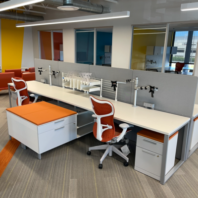 Herman Miller benching system with ergonomic chairs and modular workstations